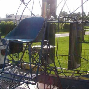 Cajun_s_seat_stand_and_cage_jpg